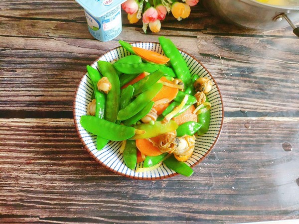 荷蘭豆炒螺肉的做法-家常味炒菜譜-易網健康養生網 荷蘭豆炒螺肉的做法-家常味炒菜譜