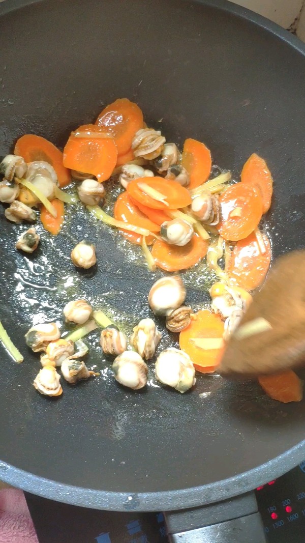 荷蘭豆炒螺肉的做法-家常味炒菜譜-易網健康養生網 荷蘭豆炒螺肉的做法-家常味炒菜譜