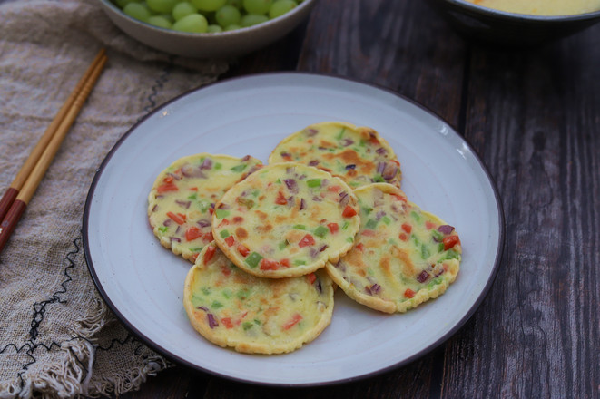 火腿雞蛋餅的做法-咸鮮味煎菜譜-易網健康養生網 火腿雞蛋餅的做法-咸鮮味煎菜譜