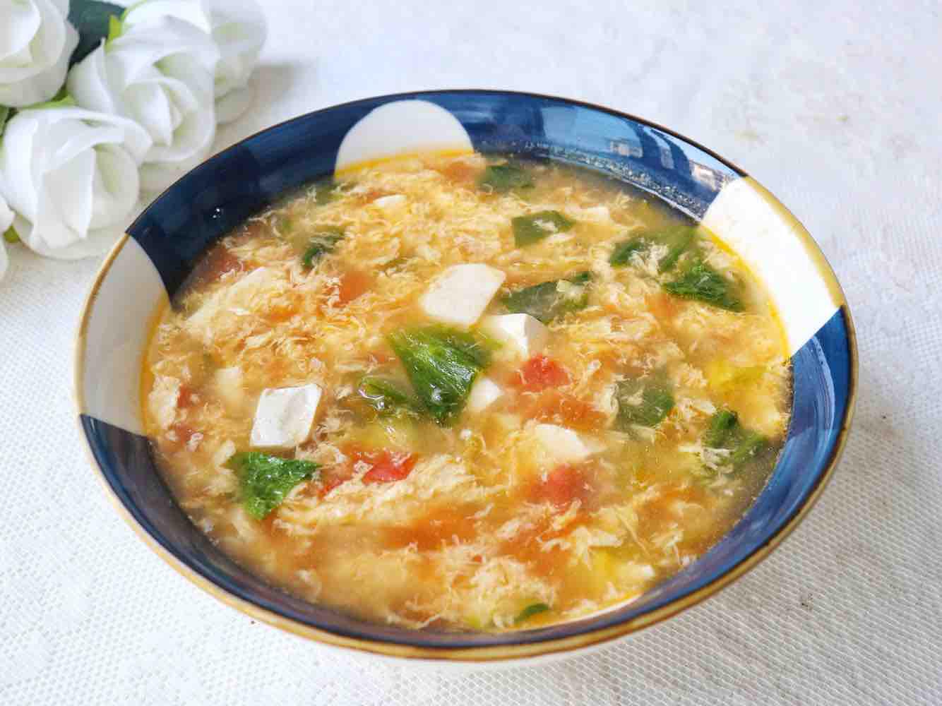 低脂番茄豆腐湯的做法-家常味煮菜譜-易網(wǎng)健康養(yǎng)生網(wǎng) 低脂番茄豆腐湯的做法-家常味煮菜譜